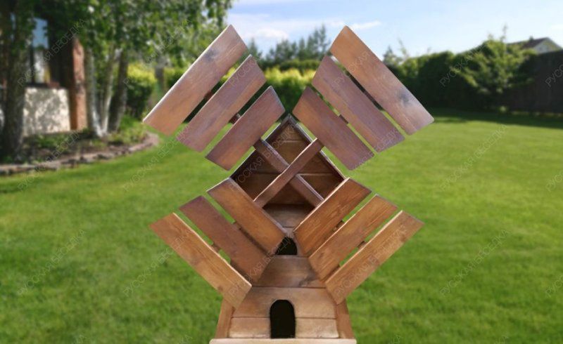 Ветряная мельница с подвижными лопастями